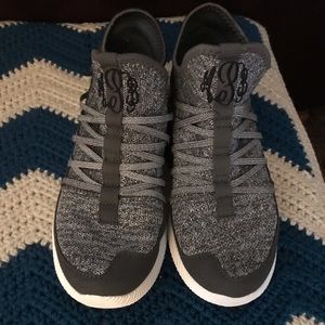 Slip on monogrammed tennis shoes